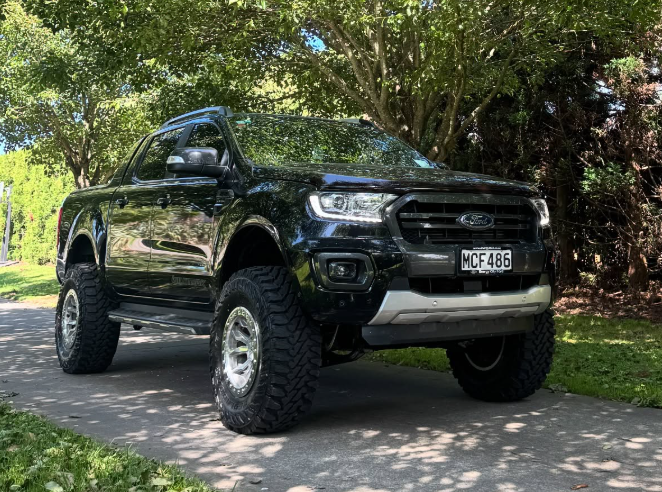 Modified black ute
