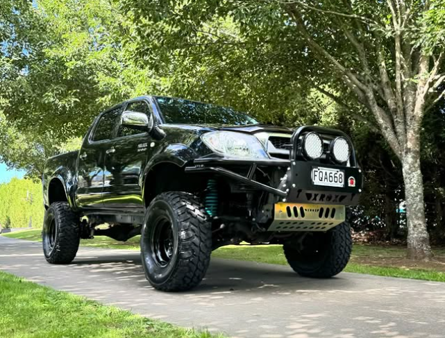 Modified black ute